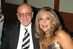 Clive Davis and Denise Rich at a party to celebrate the August nuptials of comic Daniella Rich and real-estate maven Richard Kilstock  at Pier 60 in Manhattan on October 7, 2004. photo by Rob Rich copyright 2004. 516-676-3939 robwayne1@aol.com