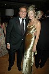Arnie Rosenshein and the 32nd. Miss USA Julie Hayek at a party to celebrate the August nuptials of comic Daniella Rich and real-estate maven Richard Kilstock  at Pier 60 in Manhattan on October 7, 2004. photo by Rob Rich copyright 2004. 516-676-3939 robwayne1@aol.com