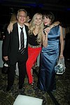 Jane and Paul Schindler with Sale Johnson at a party to celebrate the August nuptials of comic Daniella Rich and real-estate maven Richard Kilstock  at Pier 60 in Manhattan on October 7, 2004. photo by Rob Rich copyright 2004. 516-676-3939 robwayne1@aol.com