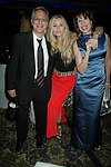 Jane and Paul Schindler with Sale Johnson at a party to celebrate the August nuptials of comic Daniella Rich and real-estate maven Richard Kilstock  at Pier 60 in Manhattan on October 7, 2004. photo by Rob Rich copyright 2004. 516-676-3939 robwayne1@aol.com