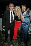 Jane and Paul Schindler with Sale Johnson at a party to celebrate the August nuptials of comic Daniella Rich and real-estate maven Richard Kilstock  at Pier 60 in Manhattan on October 7, 2004. photo by Rob Rich copyright 2004. 516-676-3939 robwayne1@aol.com