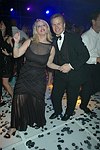 Dancing at a party to celebrate the August nuptials of comic Daniella Rich and real-estate maven Richard Kilstock  at Pier 60 in Manhattan on October 7, 2004. photo by Rob Rich copyright 2004. 516-676-3939 robwayne1@aol.com