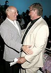 Barry Diller and Mike Nichols at the  Diane von Furstenberg fashion show  in Manhattan, N.Y. on September 12, 2004.<br>(photo by Rob Rich/ The Everett Collection)