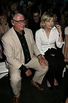 Mike Nichols and Diane Sawyer at the  Diane von Furstenberg fashion show  in Manhattan, N.Y. on September 12, 2004.<br>(photo by Rob Rich/ The Everett Collection)