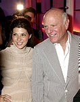 Marisa  Tomei  and Barry Diller at the  Diane von Furstenberg fashion show  in Manhattan, N.Y. on September 12, 2004.<br>(photo by Rob Rich/ The Everett Collection)