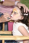Face painting at the Albert Einstein College of Medicine's Family Day Carnival at the Villa Maria in Watermill on 8-15-04<br>  photo by Rob Rich copyright 2004 516-676-3939  robwayne1@aol.com
