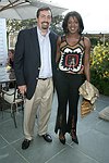 Chris Gatty and Stacey Tisdale  at the Southampton residence of Jeff Furman on 6-19-04<br>photo by Rob Rich copyright 2004   516-676-3939