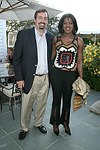 Chris Gatty and Stacey Tisdale  at the Southampton residence of Jeff Furman on 6-19-04<br>photo by Rob Rich copyright 2004   516-676-3939