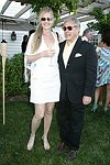 Pam Phillips and Joel Silverman at the Southampton residence of Jeff Furman on 6-19-04<br>photo by Rob Rich copyright 2004   516-676-3939