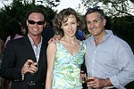 Eric Lustgarten, Irina and Roger Erickson at the Southampton residence of Jeff Furman on 6-19-04<br>photo by Rob Rich copyright 2004   516-676-3939