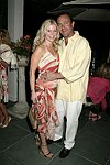 Cindy Guyer and Andrew Catapano at the Southampton residence of Jeff Furman on 6-19-04<br>photo by Rob Rich copyright 2004   516-676-3939
