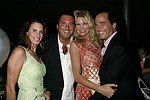 Denise and Larry Wohl, Jennifer and Todd Klein  at the G&P Fundraiser at the Southampton Residence of Denise Rich on  July 10, 2004<br> photo by Rob Rich copyright 2004 516-676-3939 robwayne1@aol.com