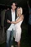 Jonathan Cheban and Lizzy Grubman  at the G&P Fundraiser at the Southampton Residence of Denise Rich on  July 10, 2004<br> photo by Rob Rich copyright 2004 516-676-3939 robwayne1@aol.com