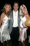 Donna Parker, Mitchell and Robin Modell  at the G&P Fundraiser at the Southampton Residence of Denise Rich on  July 10, 2004<br> photo by Rob Rich copyright 2004 516-676-3939 robwayne1@aol.com