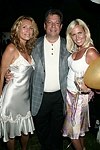 Donna Parker, Mitchell and Robin Modell  at the G&P Fundraiser at the Southampton Residence of Denise Rich on  July 10, 2004<br> photo by Rob Rich copyright 2004 516-676-3939 robwayne1@aol.com