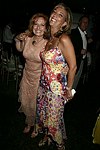 Michele Rella and Denise Rich at the G&P Fundraiser at the Southampton Residence of Denise Rich on  July 10, 2004<br> photo by Rob Rich copyright 2004 516-676-3939 robwayne1@aol.com