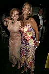 Michele Rella and Denise Rich at the G&P Fundraiser at the Southampton Residence of Denise Rich on  July 10, 2004<br> photo by Rob Rich copyright 2004 516-676-3939 robwayne1@aol.com