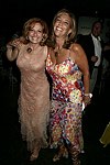 Michele Rella and Denise Rich at the G&P Fundraiser at the Southampton Residence of Denise Rich on  July 10, 2004<br> photo by Rob Rich copyright 2004 516-676-3939 robwayne1@aol.com