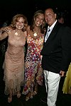 Michele Rella , Denise Rich, and Alan Beeber at the G&P Fundraiser at the Southampton Residence of Denise Rich on  July 10, 2004<br> photo by Rob Rich copyright 2004 516-676-3939 robwayne1@aol.com