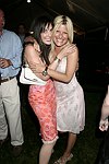 Daniella Rich and Lizzy Grubman  at the G&P Fundraiser at the Southampton Residence of Denise Rich on  July 10, 2004<br> photo by Rob Rich copyright 2004 516-676-3939 robwayne1@aol.com