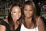 Ashanti and Star Jones  at the G&P Fundraiser at the Southampton Residence of Denise Rich on  July 10, 2004<br> photo by Rob Rich copyright 2004 516-676-3939 robwayne1@aol.com
