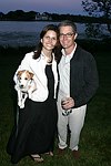 Desiree Gruber and Kyle MacLachlan at the God's Love We Deliver Mid Sumer Drinks party on 6-12-04 at the Southampton Estate of Don Burns and Gregg Connors  all photos by Rob Rich copyright 2004 516-676-3939