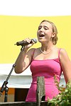 Lindsay Kremer singing the National Anthem at the 29th. Annual Hampton Classic Horse Show in Bridgehamtpon.<br>photo by Rob Rich copyright 2004<br>516-676-3939<br>robwayne1@aol.com