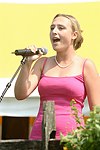 Lindsay Kremer singing the National Anthem at the 29th. Annual Hampton Classic Horse Show in Bridgehamtpon.<br>photo by Rob Rich copyright 2004<br>516-676-3939<br>robwayne1@aol.com