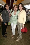 Producer Ilene Landress, Lorraine Bracco, and Sale Johnson at the Hampton Classic Horse Show on September 5, 2004  in Bridgehampton, N.Y.<br> (photo by Rob Rich copyright 2004 516-676-3939)