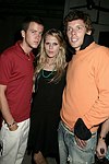 Alexandra Richards with friends at the Hampton Magazine Labor Day party at the Star Room on 9-4-04.   photo by Rob Rich copyright 2004 516-676-3939  robwayne1@aol.com