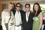NEW YORK - MAY 29:Jennifer and Todd Klein, Dr. Howard Sobel, and Paige Boller at the Hampton's Magazine Party at Jason Binn's Southampton residence on May 29, 2004<br>(photo by Rob Rich/Getty Images)