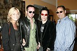 NEW YORK - MAY 29:Ingrid Parewijck, Drew Naprawa, Michael H, and Jules Abadi  at the Hampton's Magazine Party at Jason Binn's Southampton residence on May 29, 2004<br>(photo by Rob Rich/Getty Images)