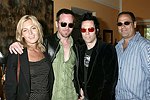 NEW YORK - MAY 29:Ingrid Parewijck, Drew Naprawa, Michael H, and Jules Abadi  at the Hampton's Magazine Party at Jason Binn's Southampton residence on May 29, 2004<br>(photo by Rob Rich/Getty Images)