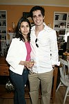 NEW YORK - MAY 29: Zully Avellaneda and TJ Milo at the Hampton's Magazine Party at Jason Binn's Southampton residence on May 29, 2004<br>(photo by Rob Rich/Getty Images)