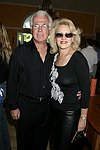 NEW YORK - MAY 29: Steve and Louise Kornfeld at the Hampton's Magazine Party at Jason Binn's Southampton residence on May 29, 2004<br>(photo by Rob Rich/Getty Images)