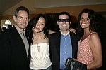 NEW YORK - MAY 29: Neil Simon, Rosalyn Jang, Robert Siebel, and Carey Lorenzo at the Hampton's Magazine Party at Jason Binn's Southampton residence on May 29, 2004<br>(photo by Rob Rich/Getty Images)