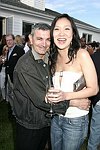 NEW YORK - MAY 29: John Roca and Rosalyn Jang  at the Hampton's Magazine Party at Jason Binn's Southampton residence on May 29, 2004<br>(photo by Rob Rich/Getty Images)
