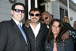 NEW YORK - MAY 29:Robert Siebel, Rocco Ancarola, Merv Matheson, and guest at the Hampton's Magazine Party at Jason Binn's Southampton residence on May 29, 2004<br>(photo by Rob Rich/Getty Images)