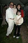 NEW YORK - MAY 29: Lou, Eva , Rhona, and Alexander Riccio at the Hampton's Magazine Party at Jason Binn's Southampton residence on May 29, 2004<br>(photo by Rob Rich/Getty Images)