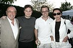 NEW YORK - MAY 29:Atlantic Records Ahmet Ertegun, Jason Binn, Jason Oliver Nixon, and Mica Ertegun at the Hampton's Magazine Party at Jason Binn's Southampton residence on May 29, 2004<br>(photo by Rob Rich/Getty Images)