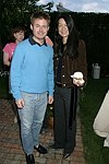 NEW YORK - MAY 29:Tim and Helen Lee Schifter at the Hampton's Magazine Party at Jason Binn's Southampton residence on May 29, 2004<br>(photo by Rob Rich/Getty Images)