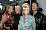 NEW YORK - MAY 29: Denise Rich, Dennis Basso, Ivana Trump, and Rossano Rubicondi at the Hampton's Magazine Party at Jason Binn's Southampton residence on May 29, 2004<br>(photo by Rob Rich/Getty Images)