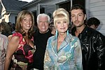 NEW YORK - MAY 29: Denise Rich, Dennis Basso, Ivana Trump, and Rossano Rubicondi at the Hampton's Magazine Party at Jason Binn's Southampton residence on May 29, 2004<br>(photo by Rob Rich/Getty Images)