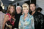 NEW YORK - MAY 29: Denise Rich, Dennis Basso, Ivana Trump, and Rossano Rubicondi at the Hampton's Magazine Party at Jason Binn's Southampton residence on May 29, 2004<br>(photo by Rob Rich/Getty Images)