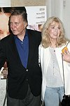 Cliff Robertson and produce Nellie Bellflower at the 'Finding Neverland' movie screening at the UA cinema in Southampton, N.Y. on 8-29-04.photo by Rob Rich copyright 2004<br>516-676-3939<br>robwayne1@aol.com