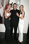 CEO of Gilan Ferhan Geylan with models wearing Gilan jewelry designs at the Parrish Art Museum's Midsummer   Gala in Southampton, N.Y. on July 17, 2004. photo by Rob Rich copyright 2004 516-676-3939 robwayne1@aol.com 112 12th. Ave, Sea Cliff, N.Y. 11579 USA