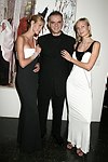 CEO of Gilan Ferhan Geylan with models wearing Gilan jewelry designs at the Parrish Art Museum's Midsummer   Gala in Southampton, N.Y. on July 17, 2004. photo by Rob Rich copyright 2004 516-676-3939 robwayne1@aol.com 112 12th. Ave, Sea Cliff, N.Y. 11579 USA