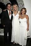 Douglas Hannet,Pamela Gross,and Liila Taghinia-Milani Heller  at the Parrish Art Museum's Midsummer   Gala in Southampton, N.Y. on July 17, 2004. photo by Rob Rich copyright 2004 516-676-3939 robwayne1@aol.com 112 12th. Ave, Sea Cliff, N.Y. 11579 USA