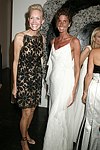 Joanne DiGuardiola and Somers Farkas  at the Parrish Art Museum's Midsummer   Gala in Southampton, N.Y. on July 17, 2004. photo by Rob Rich copyright 2004 516-676-3939 robwayne1@aol.com 112 12th. Ave, Sea Cliff, N.Y. 11579 USA