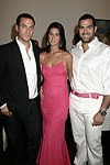 Eric Richman, Amanda Richman, and guest at the Parrish Art Museum's Midsummer   Gala in Southampton, N.Y. on July 17, 2004. photo by Rob Rich copyright 2004 516-676-3939 robwayne1@aol.com 112 12th. Ave, Sea Cliff, N.Y. 11579 USA
